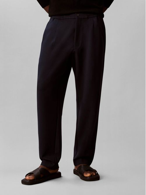 Pantalon-Calvin-Klein-Tapered-Tech-Knit-Plisado-Hombre-Azul-4LF607G-CEF