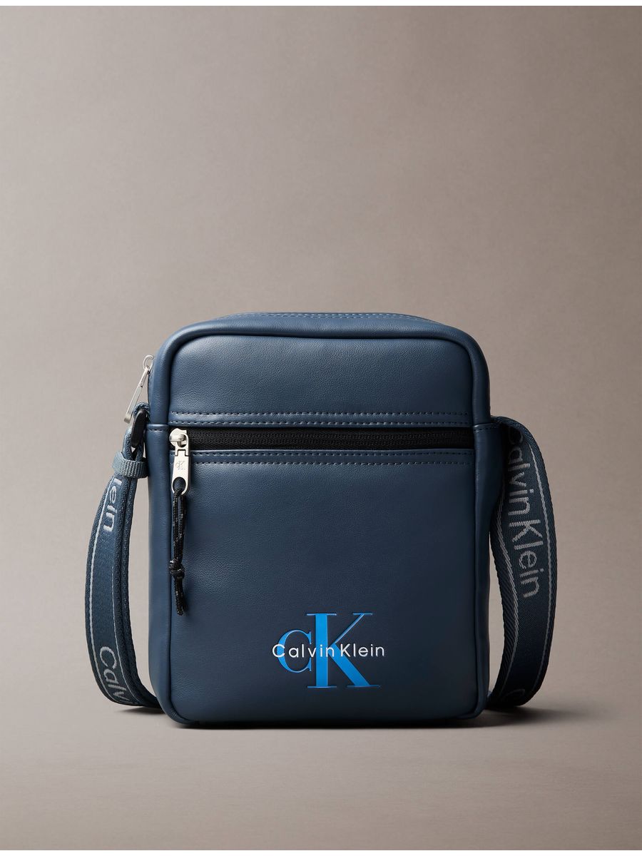bolsa-calvin-klein-logo-webbing-reporter-hombre-azul-4d3418g-y08