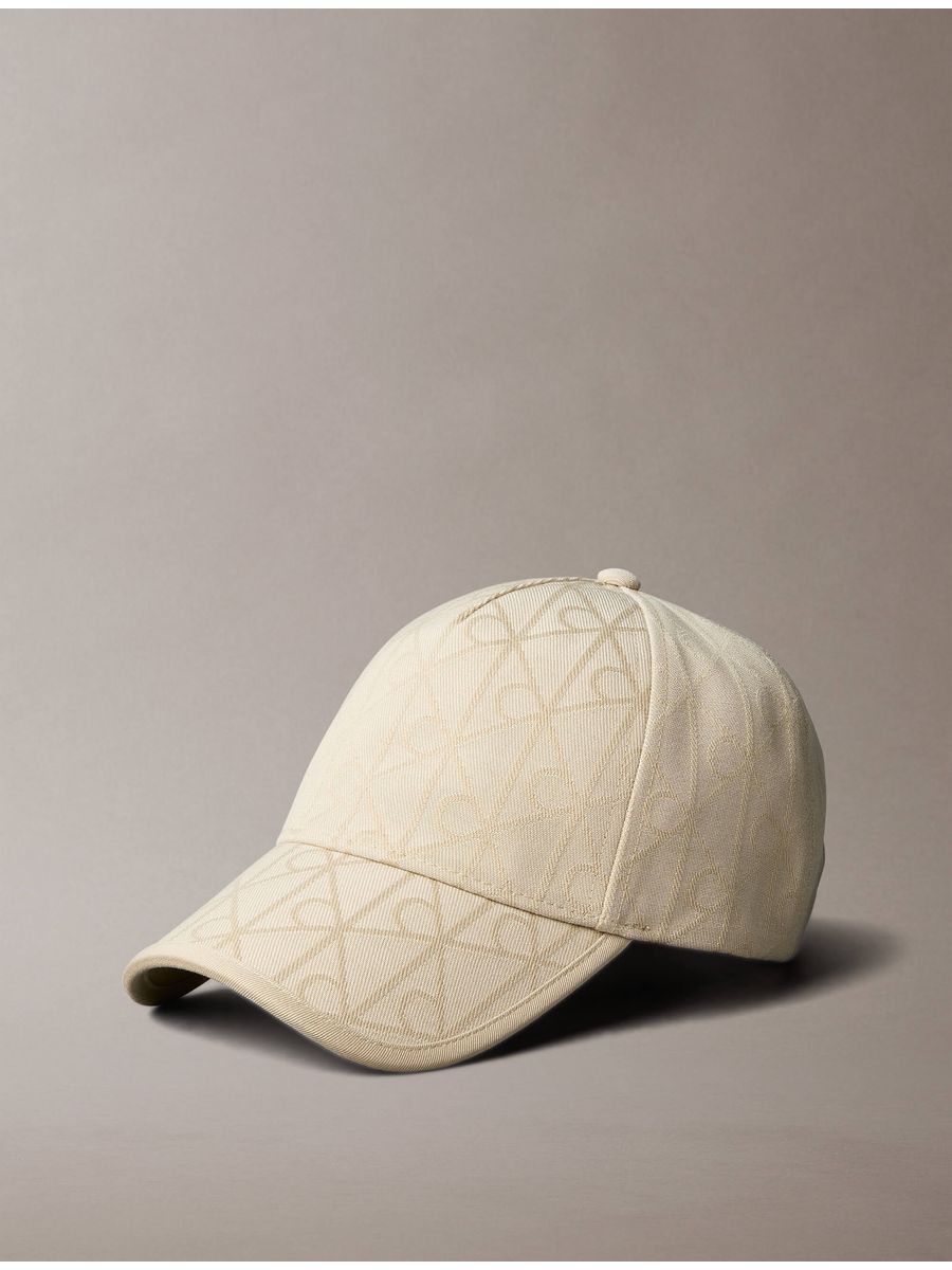 gorra-calvin-klein-logo-aop-jacquard-tie-back-mujer-beige-4f5082g-4gk
