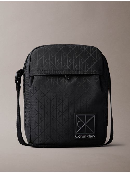 bolsa-reporter-emblem-calvin-klein-hombre-negro-4d3303g-ub1