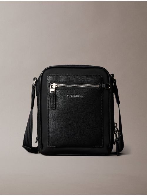 bolsa-reporter-raised-logo-calvin-klein-hombre-negro-4d3500g-ub1