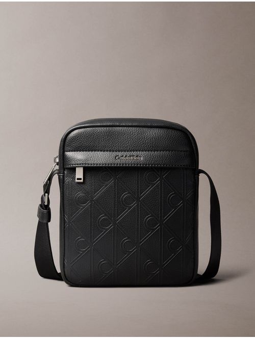 bolsa-reporter-emblem-aop-calvin-klein-hombre-negro-4d3562g-ub1