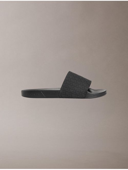 sandalias-slide-aop-calvin-klein-hombre-gris-oscuro-hm0hm02110-0gt